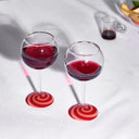 Shop Now SWIRL WINE GLASSES - RED + PINK at Fazeek