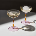 Shop Now STRIPED COUPE GLASSES - PINK + AMBER at Fazeek